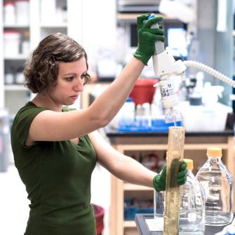 A Trainee Uses Sophisticated Equipment in a Laboratory